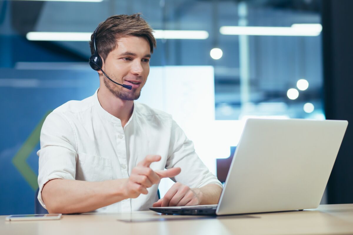 IT support being provided remotely on a laptop